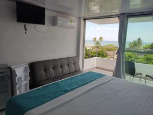 Postelja oz. postelje v sobi nastanitve Sky view hotel tolu