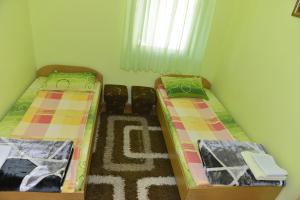 Postel nebo postele na pokoji v ubytování Kuca za odmor Dragina