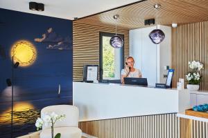 Lobbyen eller receptionen på EDEN HÔTEL