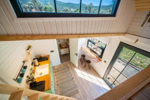 an overhead view of a tiny house with a large window at ROOT TINY HOUSE KALKAN in Kas