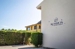 Сертификат, награда, вывеска или другой документ, выставленный в KOSMOS B&B