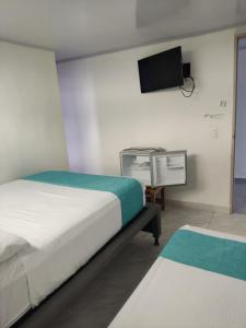 Postelja oz. postelje v sobi nastanitve Sky view hotel tolu