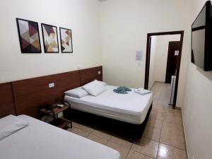 Postel nebo postele na pokoji v ubytování Hotel Serra do Mar