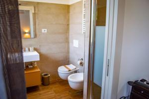 Ванная комната в KOSMOS B&B