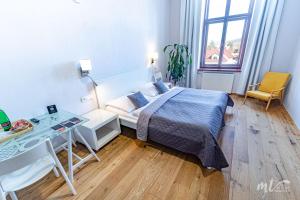 Posteľ alebo postele v izbe v ubytovaní Hotel Centrum