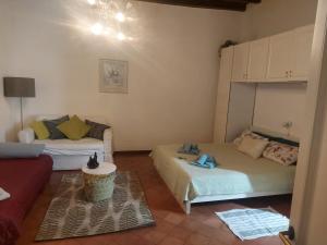 Posteľ alebo postele v izbe v ubytovaní Navona Square House