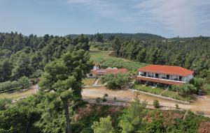 an aerial view of a house on a hill at MaGia Peristeridi in Polychrono