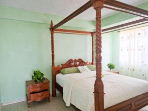 Katil atau katil-katil dalam bilik di Belle View Apartment Villas