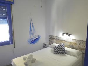 Postel nebo postele na pokoji v ubytování Hotel Bergantí
