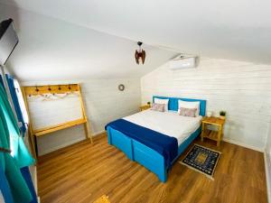 Voodi või voodid majutusasutuse Manu B&B toas