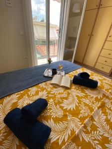 Postel nebo postele na pokoji v ubytování Kaldis Apartment