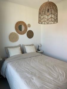 Postel nebo postele na pokoji v ubytování Vakantie Nieuwpoort Bad