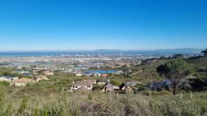 a view of a city from the top of a hill at Vrede Selfcatering Apartments in Somerset West