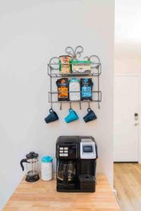 a coffee maker on a counter in a kitchen at Gruene Getaway in New Braunfels