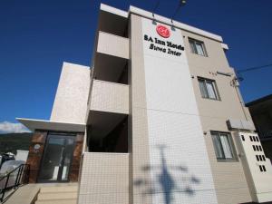 a building with a sign on the side of it at SA Inn Suwa inter - Vacation STAY 19335v in Suwa