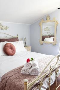 מיטה או מיטות בחדר ב-Tenuta delle Acque