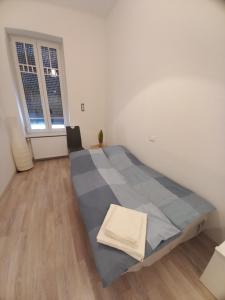 A bed or beds in a room at Vivi Residence 2