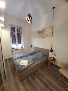 A bed or beds in a room at Vivi Residence 2
