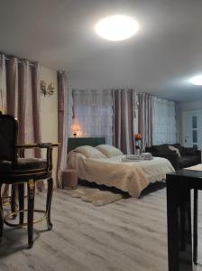 Postel nebo postele na pokoji v ubytování Gite Luxury à Soultzeren