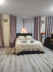Postel nebo postele na pokoji v ubytování Gite Luxury à Soultzeren