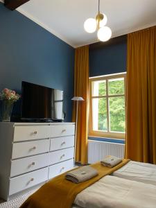 Posteľ alebo postele v izbe v ubytovaní CIENISTA 7 APARTMENTS