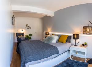 Postel nebo postele na pokoji v ubytování Impresionante apartamento en Plaza de Galicia