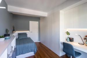 Postel nebo postele na pokoji v ubytování Impresionante apartamento en Plaza de Galicia
