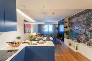 Kuchyň nebo kuchyňský kout v ubytování Impresionante apartamento en Plaza de Galicia