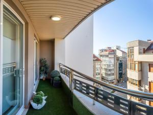 Balkón nebo terasa v ubytování Impresionante apartamento en Plaza de Galicia