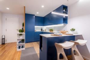 Kuchyň nebo kuchyňský kout v ubytování Impresionante apartamento en Plaza de Galicia