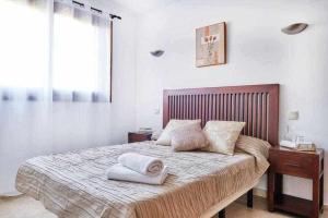 Postel nebo postele na pokoji v ubytování Espanhouse Linda apartment