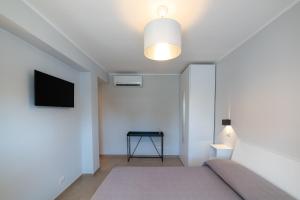 TV a/nebo společenská místnost v ubytování Citrarium B&B - Apartaments