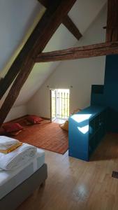 Ένα ή περισσότερα κρεβάτια σε δωμάτιο στο Ma Maison Chambourgeoise +9 φωτογραφίες