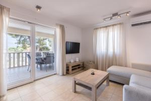 Televisyen dan/atau pusat hiburan di MAR Sea View Apartment