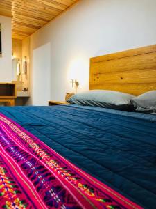 Postel nebo postele na pokoji v ubytování Hotel María del Tío Molcas