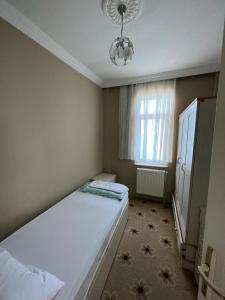 Postel nebo postele na pokoji v ubytování Yalı Suite Villa
