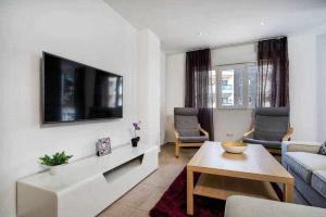 TV a/nebo společenská místnost v ubytování Espanhouse Margaret apartment
