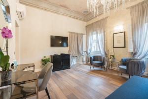 TV a/nebo společenská místnost v ubytování Relais Condotta
