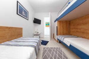 Postel nebo postele na pokoji v ubytování Apartman Oranž + 37 fotografií