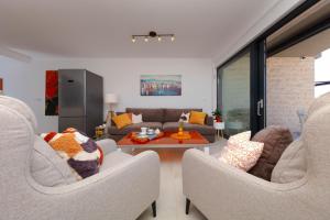 Posezení v ubytování Apartman Oranž
