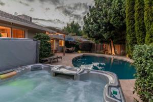 a swimming pool in the backyard of a house at Elegant River Park Sanctuary in Sacramento