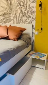 Postel nebo postele na pokoji v ubytování La baie de Rose + 19 fotografií