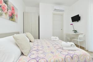 Postel nebo postele na pokoji v ubytování B&b Il sogno