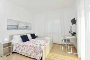 Postel nebo postele na pokoji v ubytování B&b Il sogno