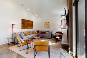 a living room with a couch and chairs at Belmont Beauty in Ketchum