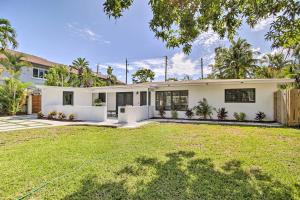 a large white house with a yard at Fort Lauderdale Home Near Shops, Cafes, Beach in Fort Lauderdale