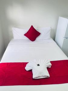 Postel nebo postele na pokoji v ubytování Walmsley Motel Mangere
