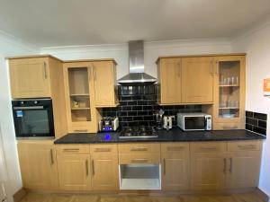 A kitchen or kitchenette at Central Stratford Cozy Double Room