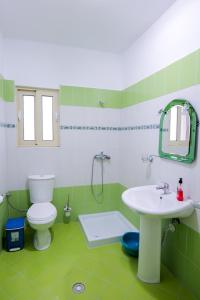 Koupelna v ubytování Rei Apartments