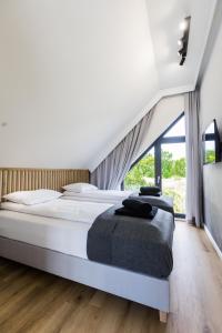 Łóżko lub łóżka w pokoju w obiekcie Mare Boutique Houses